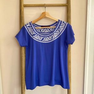 Petite blue shirt with white embroidery, good used condition